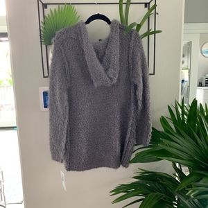 Brand new with tags, fuzzy cardigan.